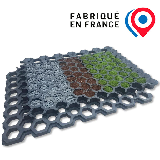 Dalles alvéolées formant un parking drainant et carrossable