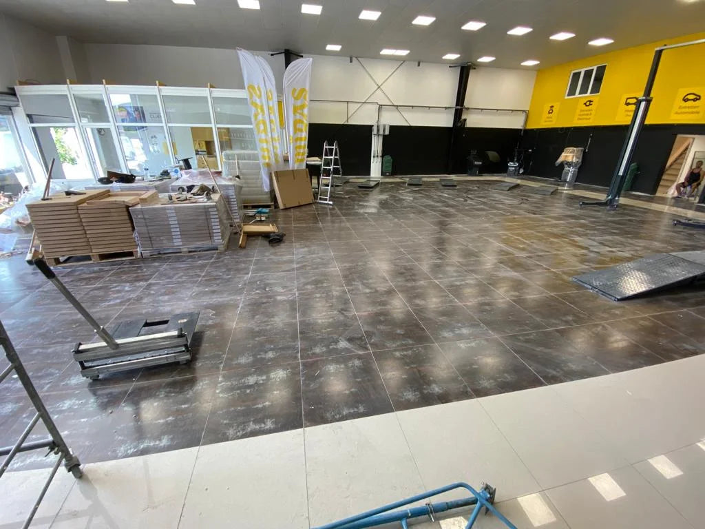 Before: Very slippery tile floor in the Brie Auto Services workshop (77)